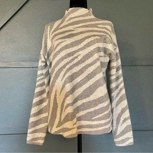 Tahari women’s knit zebra print long sleeve crew neck sweater. Size MED